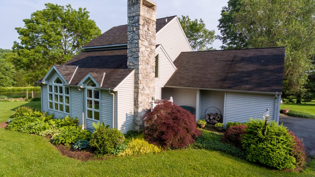 beautiful home with stone chimney and large backyard for sale in pa