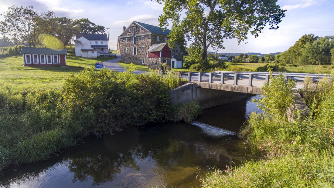 large home for sale next to a creek in pa