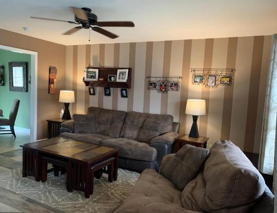 living room furniture and amenities in new home for sale in wilson school district