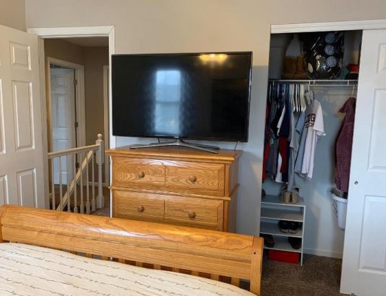 television sitting on dresser in new home for sale bedroom